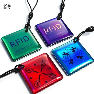 Aangepaste 13,56MHz programmeerbare NTAG213 Smart Epoxy Keyfob Tags RFID Tag NFC Sleutelhanger